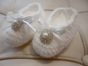Baby booties hand crocheted with diamontee and pearl buttons